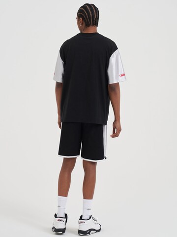 AND1 Póló - fekete