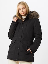 Woman in a Superdry winter parka