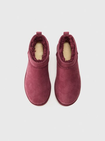 UGG - Botas 'CLASSIC ULTRA MINI' em rosa