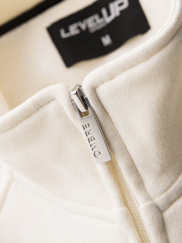 Ombre - Sudadera con cremallera en beige