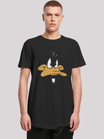 F4NT4STIC Shirt 'Looney Tunes Daffy Duck Big Face' in Zwart: voorkant