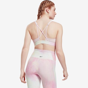 Reebok Bustier Sportmelltartók 'Lux Strappy' - rózsaszín