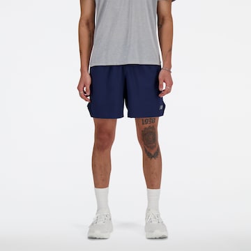 Pantalon de sport new balance en bleu : devant