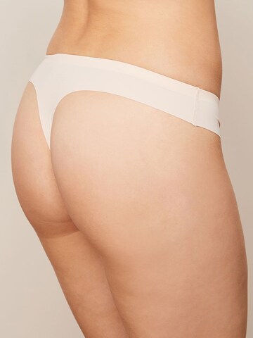 Next String i beige