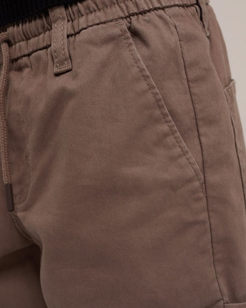 regular Pantaloni di WE Fashion in marrone