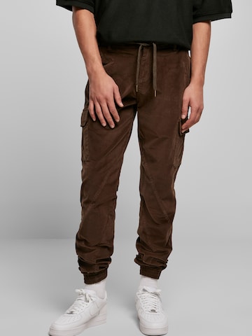 Loosefit Pantalon cargo Urban Classics en vert : devant