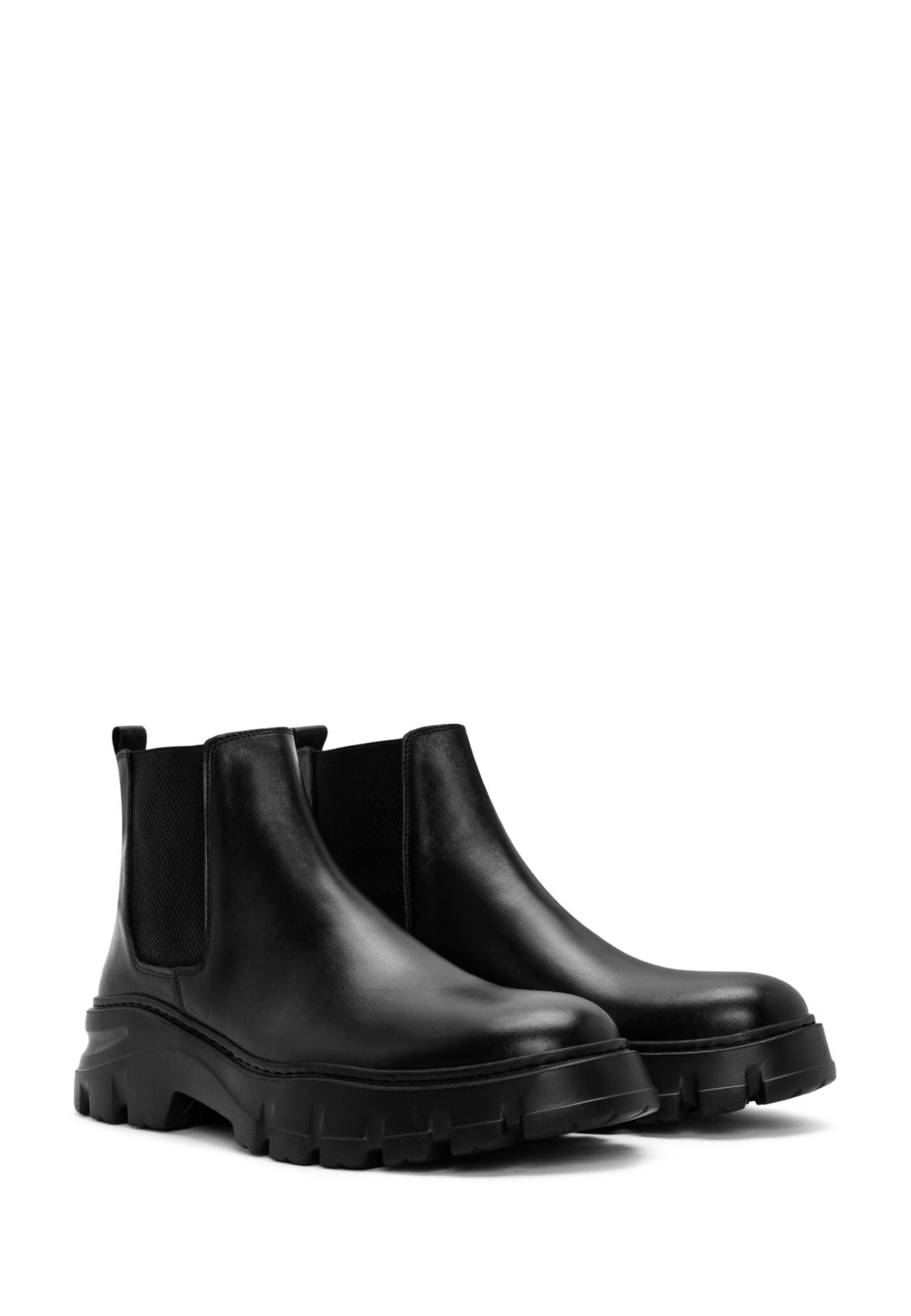 Derimod Chelsea boots in Zwart