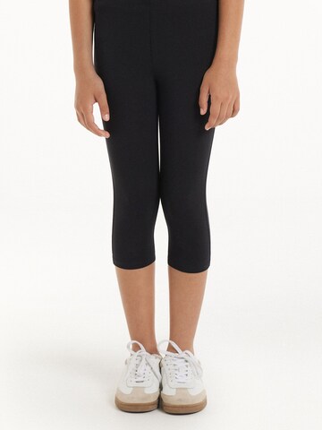 Tezenis Skinny Leggings in Black: front