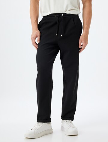 Koton Trousers in Black: front
