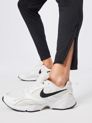 NIKE Slim fit Workout Pants 'Strike' in Black