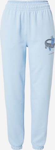 Effilé Pantalon de sport LACOSTE en bleu : devant