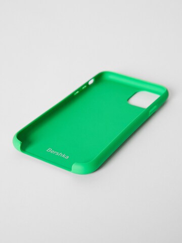 Husă de smartphoneuri de la Bershka pe verde