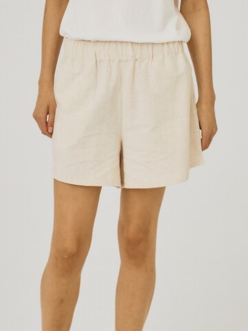 NORR Loose fit Trousers in Beige: front