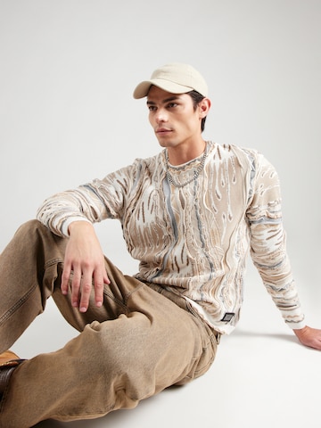 Pull-over Carlo Colucci en beige : devant