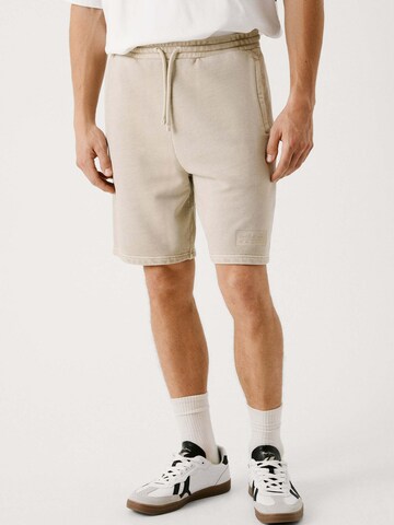 Loosefit Pantalon Red Bull Racing x Pepe Jeans en beige : devant