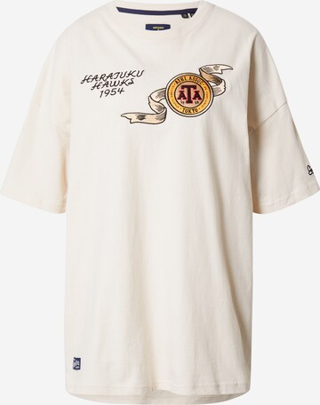 T-shirt 'VINTAGE' Superdry en beige : devant