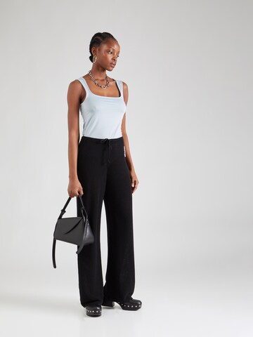 regular Pantaloni 'FADE HOLIDAY' di RVCA in nero