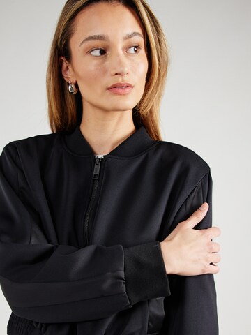 juoda DKNY Demisezoninė striukė