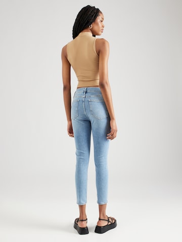 FRAME Skinny Jeans in Blau