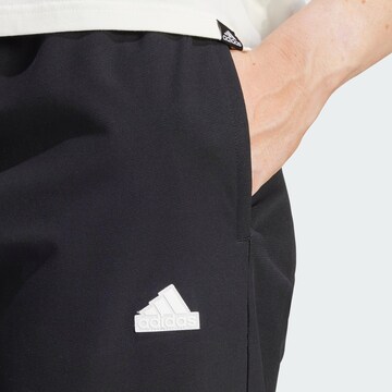 Regular Pantalon de sport 'City Escape' ADIDAS SPORTSWEAR en noir