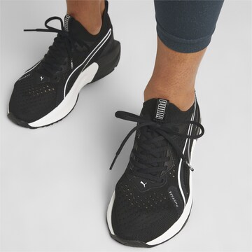 PUMA Sportschuh 'PWR XX NITRO Luxe' in Schwarz