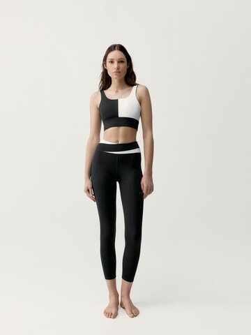 Born Living Yoga Skinny Sportbroek 'Kate' in Zwart: voorkant