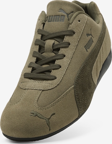PUMA Sneakers in Green: front