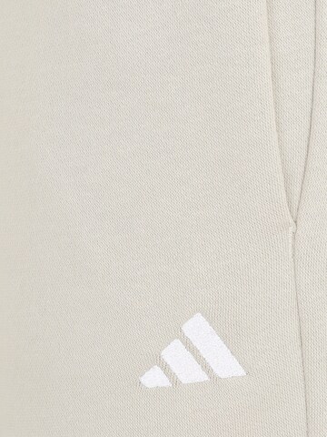 ADIDAS SPORTSWEAR - Pierna ancha Pantalón deportivo en beige