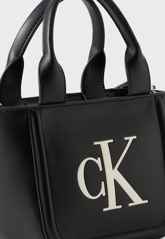 Calvin Klein Käekott 'BOLD', värv must: eest vaates