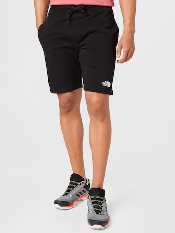 THE NORTH FACE Regular Trousers in Black: front