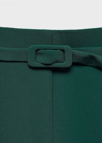 MANGO Rozkloszowany krój Spodnie w kant 'Iguana' w kolorze zielony