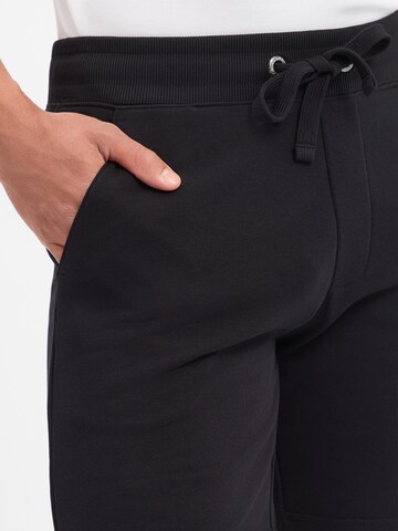 Regular Pantalon Nils Sundström en noir