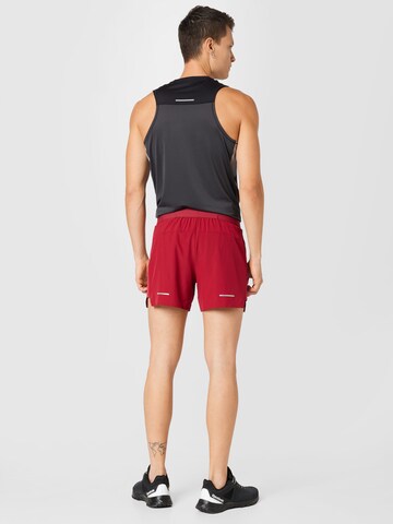 ASICS Regular Workout Pants 'Road' in Red