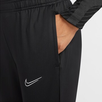 Slimfit Pantaloni sportivi 'Strike' di NIKE in nero