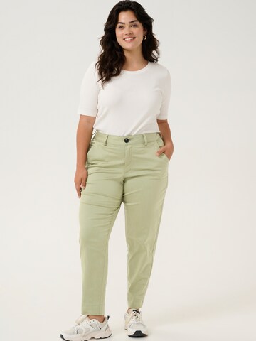 KAFFE CURVE Slimfit Kalhoty 'Leana' – zelená