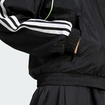 ADIDAS ORIGINALS Übergangsjacke in Schwarz