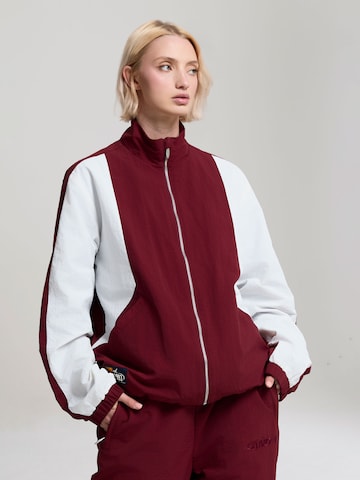 AND1 Přechodná bunda 'Core Getäfelt' – červená: přední strana