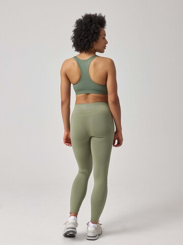 SNOCKS Skinny Sportbroek 'Seamless' in Groen