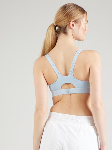 Bustier Soutien-gorge de sport 'INDY' NIKE en bleu