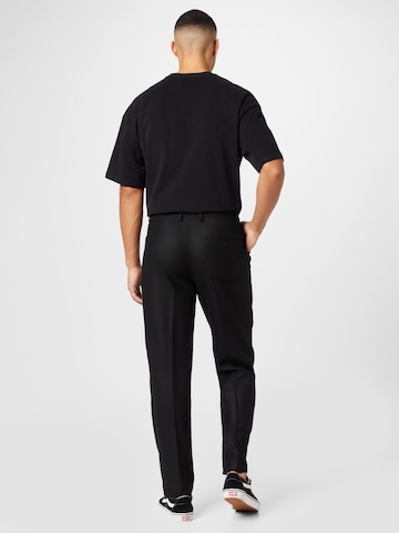 regular Pantaloni con pieghe di Wax London in nero