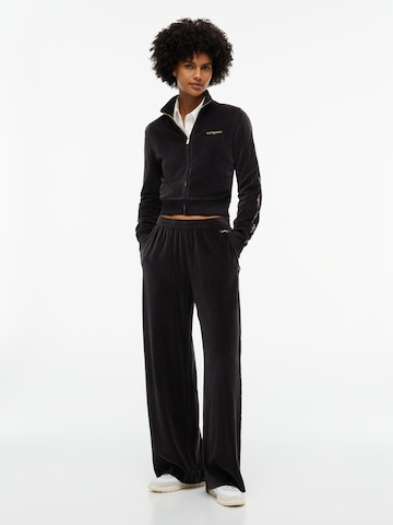 Wide leg Pantaloni de la Tommy Jeans pe negru