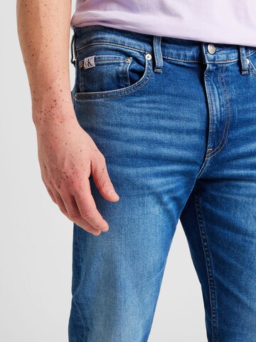 Calvin Klein Jeans Normalny krój Jeansy 'SLIM TAPER' w kolorze niebieski