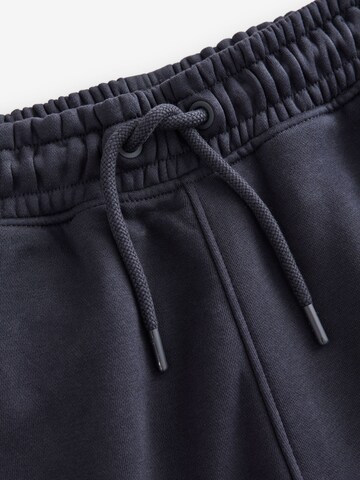 Next Tapered Gargohousut värissä sininen