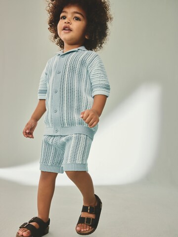 Set Next en bleu