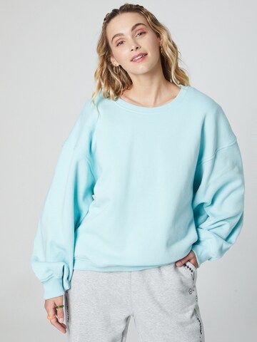 florence by mills exclusive for ABOUT YOU Sweatshirt 'Oak' in Blauw: voorkant