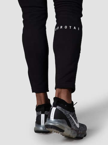 MOROTAI Slimfit Sporthose 'NEOTECH' in Schwarz