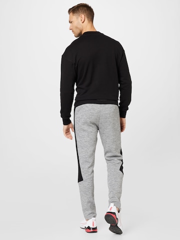 PUMA Slim fit Workout Pants in Grey