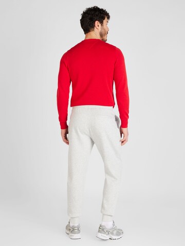 TOMMY HILFIGER Tapered Housut värissä harmaa