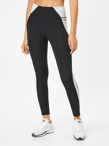 PUMA Skinny Workout Pants in Black: front