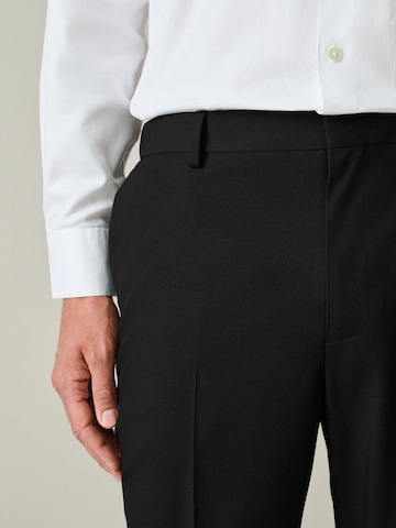 Next Regular Trousers with creases 'Motionflex' in Black